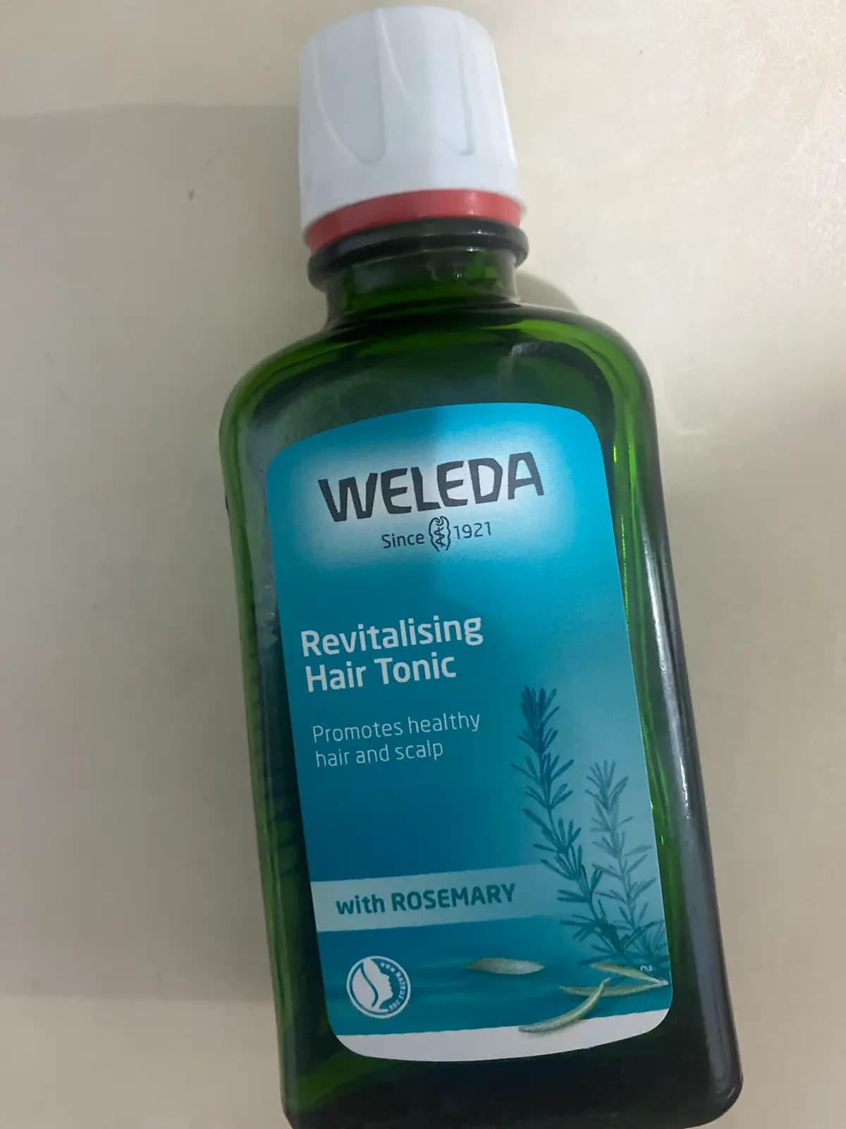Weleda Rosemary Revitalising Hair Tonic - 產品正面包裝 | cosGlint